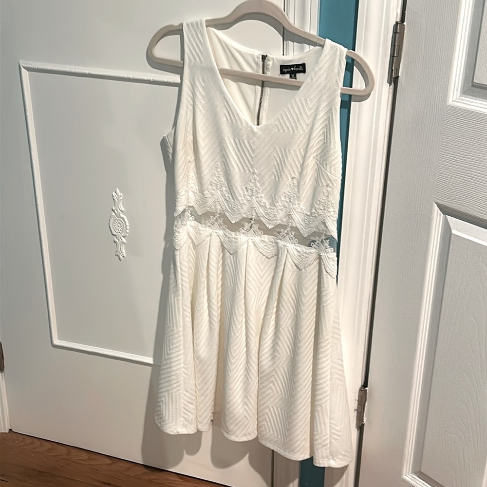 White dress from the brand Sequin Heart. size 13. worn once!